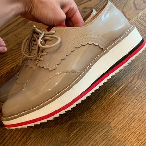 Patent leather lace up shoe